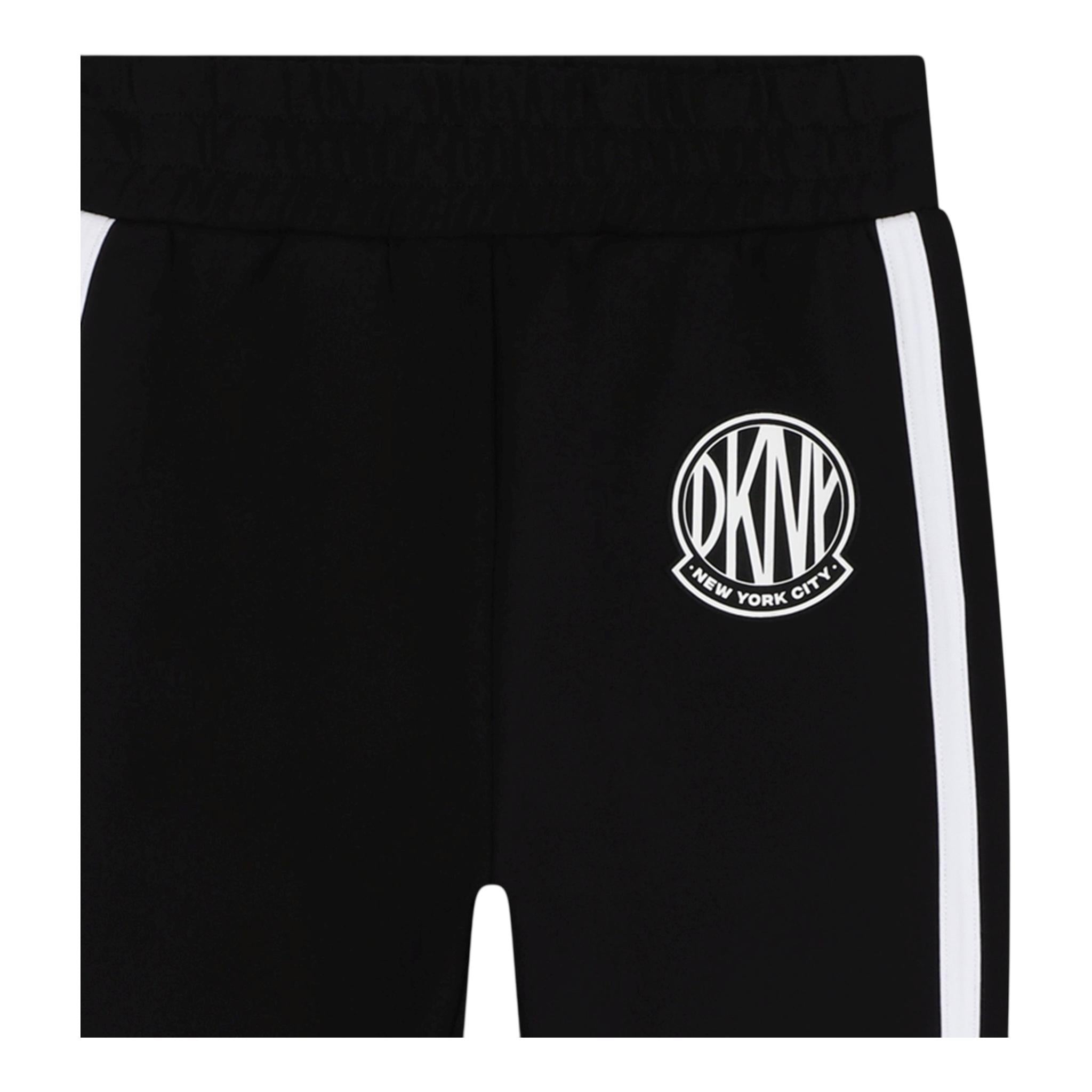 DKNY pantalone tuta tinta unita con profili in contrasto Nero per Bambino D60175 NERO DKNY