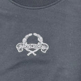 MOSCHINO felpa girocollo tinta unita con stampa Nero per Bambino HWF08V NERO MOSCHINO