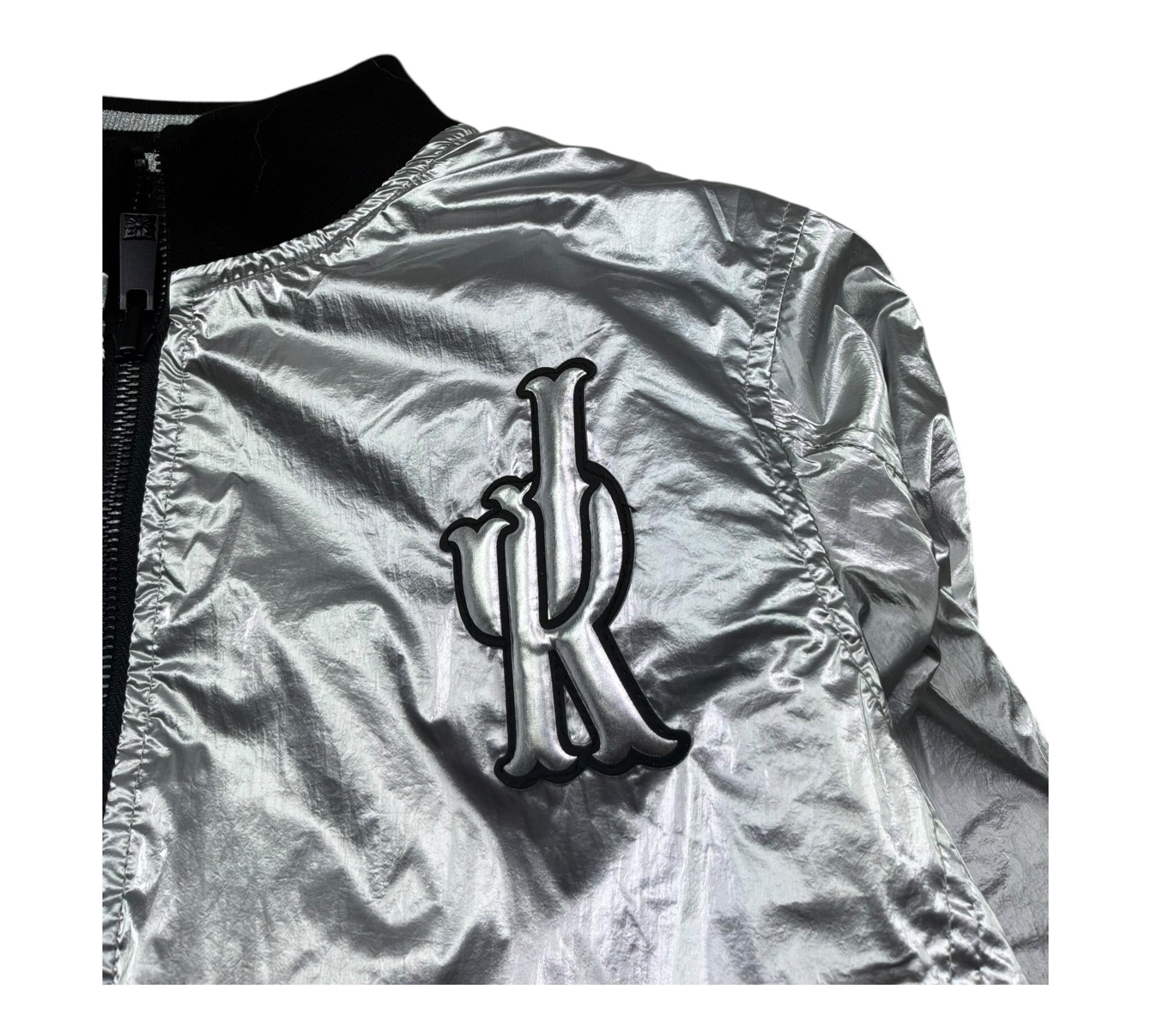 John Richmond Giubbino Reversibile con Zip Bicolore per Bambina RGP26037GB NERO/ARGENTO JOHN RICHMOND 