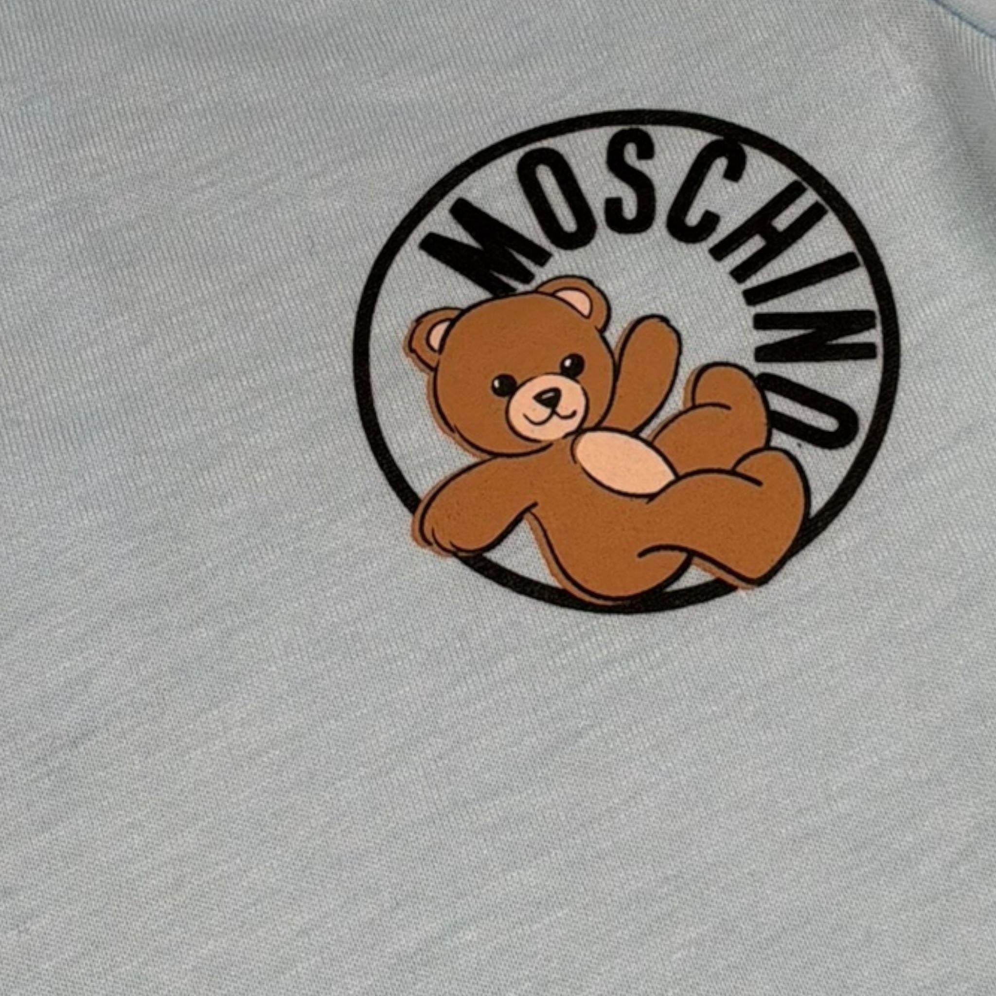 Moschino Pagliacceto Tinta Unita con Colletto per Neonato MMY03Y AZZURRO MOSCHINO 