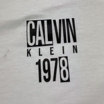 Calvin Klein T-Shirt Girocollo Tinta Unita con Stampa per Bambino IB0IB02456 BIANCO CALVIN KLEIN 
