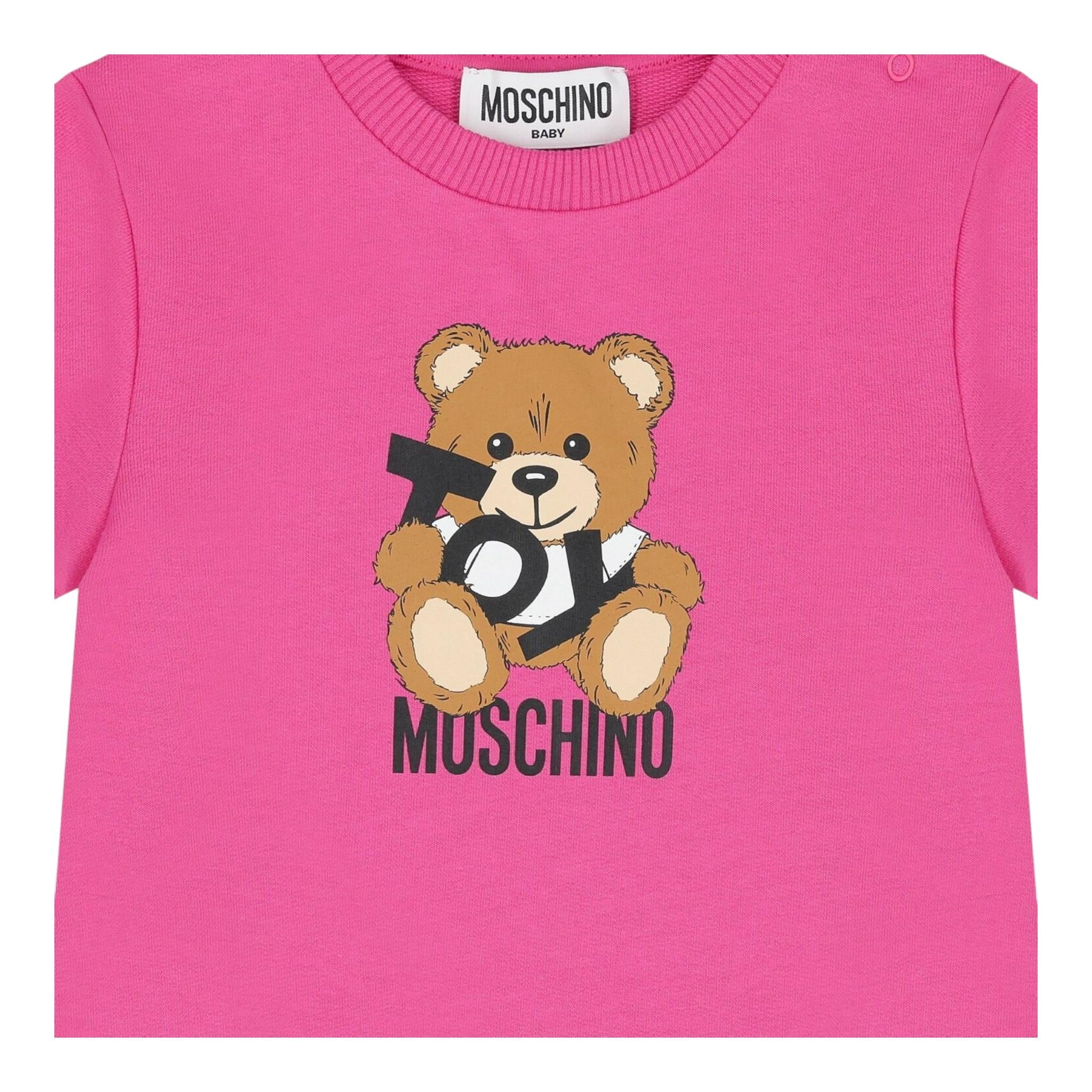 Moschino Abito Girocollo Tinta Unita con Stampa per Neonata MDV0C9XXX FUXIA MOSCHINO 