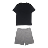 New Balance Completo 2 Pezzi T-Shirt-Bermuda Bicolore per Bambino LAKB0133X NERO/GRIGIO NEW BALANCE 