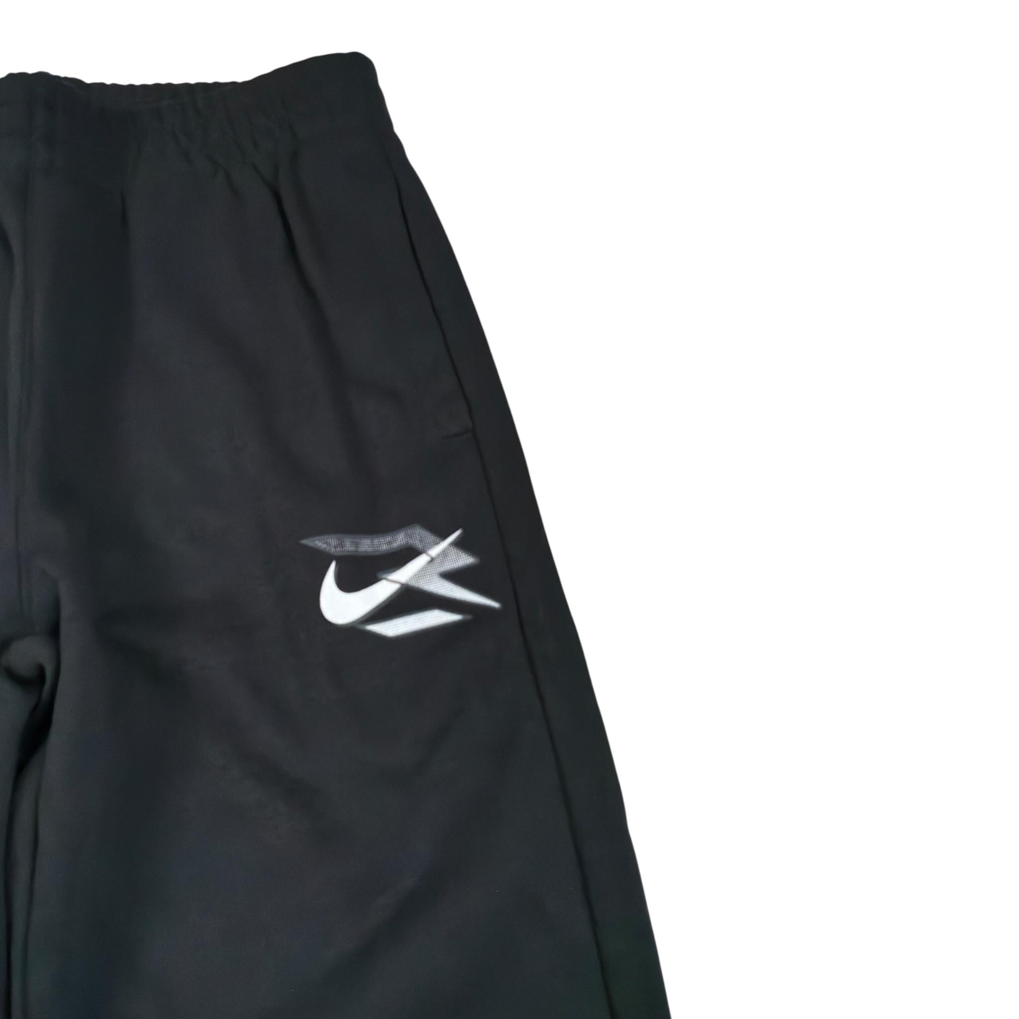 Nike Pantalone Tuta tinta unita con Logo Nero per Bambino 9Q1094X NERO NIKE 